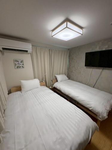 Koenjikita Apartment | さくら旅館高円寺北千利休102号室
