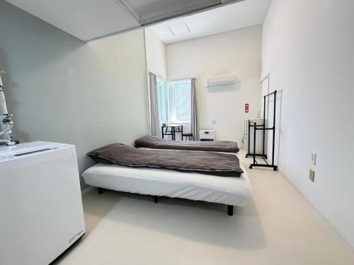 Toyohira Apartment | キャンパスサイドCampus Side 202号室