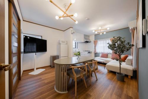 Fukushima Villa | ステイワン SOsaka 大阪駅まで1分 寝室4部屋ベッド7台 最大11名利用