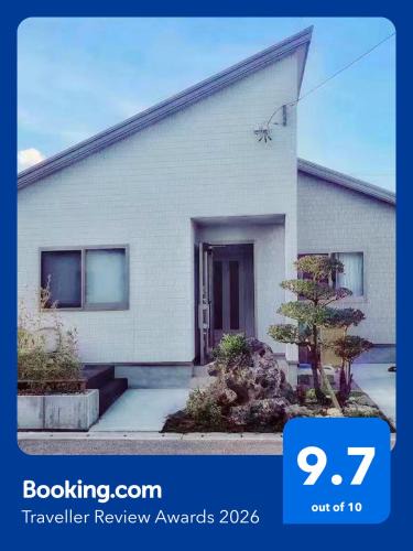 Okinawa House | 空港まで車で15分〜ビーチまで徒歩1分〜海沿いの野鶴居