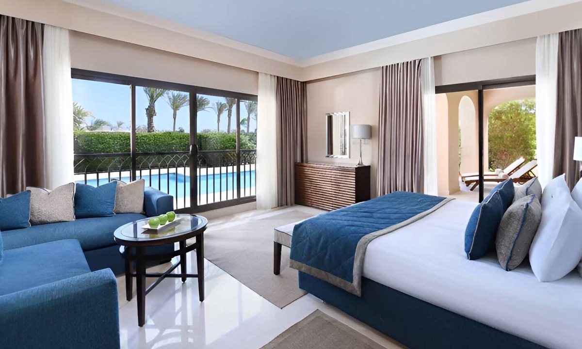 Village Road Resort | Bright Resort Room with Private Terrace, Pools, Beach Access & Entertainment