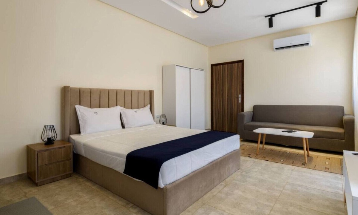 Cairo Apartment | Comfy Studio with Balcony | Queen Bed , Sofa and Kitchenette and shared community garden