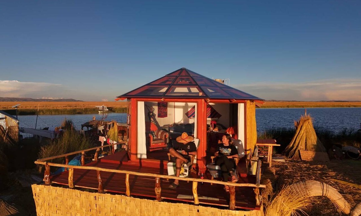 Puno Hotel | Little house on the floating islands of the Uros, Lake Titicaca, Puno-Peru