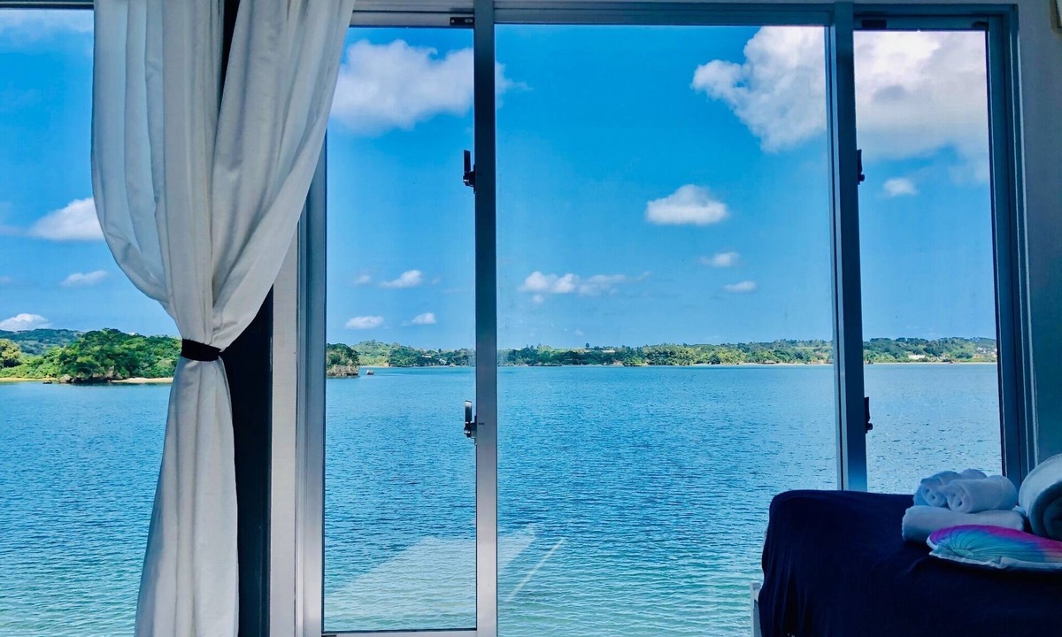 Nago Apartment | RossoThe sea is just outside the window You /Nago Okinawa