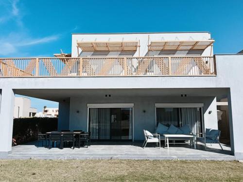Ad-Dab'ah Apartment | Standalone Villa 4 BR in Playa North Coast U9