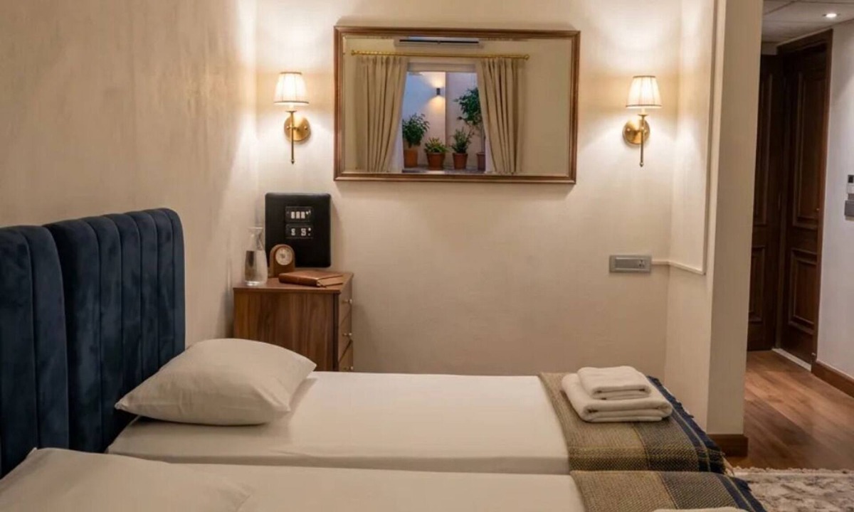 Luxor Hotel | Twin Room with King Bed Setup, Wi-Fi, AC & Private Bathroom