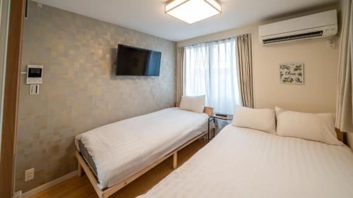 Koenjikita Apartment | さくら旅館高円寺北千利休101号室