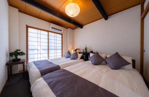 Nishi Villa | ちよ 桜と過ごすお部屋 usjまで電車で10分 4つの寝室 お風呂2台 トイレ4台
