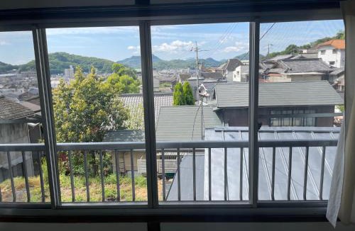 Onomichi Apartment | イヤシロチomoya