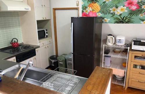 Amami Apartment | ゲストハウス奄美ルリカケス