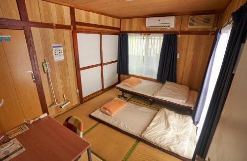 Nakasonecho Apartment | コザを楽しむ一軒家 Kaeruhouse