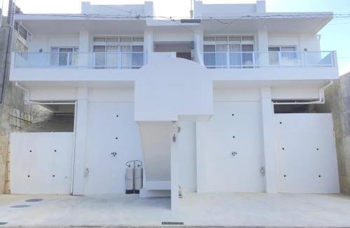 Motobu Apartment | コテージ花