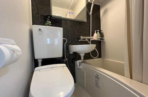 Kabukicho Apartment | ゴジラヘッドまで徒歩9分 最寄り駅まで4分 ダブルベッド数台ファミリー向け部屋