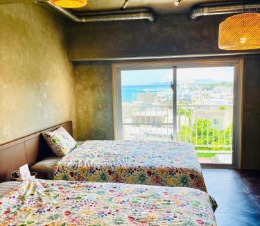 Maeganeku Apartment | シートピア恩納村Ocean 贅沢快適なデザイナーズ空間と蒼い海