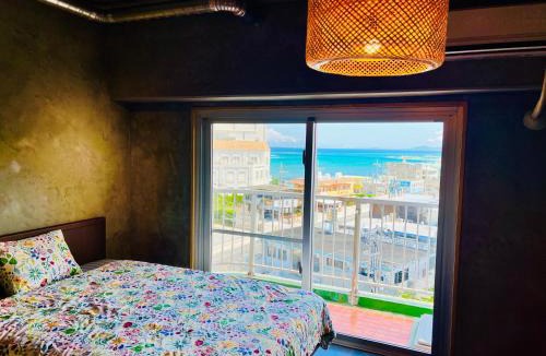 Maeganeku Apartment | シートピア恩納村Ocean 贅沢快適なデザイナーズ空間と蒼い海