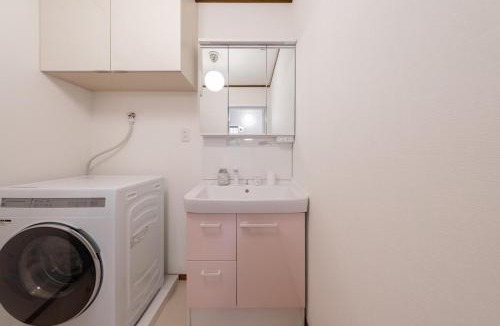 Fukushima Villa | ステイワン SOsaka 大阪駅まで1分 寝室4部屋ベッド7台 最大11名利用
