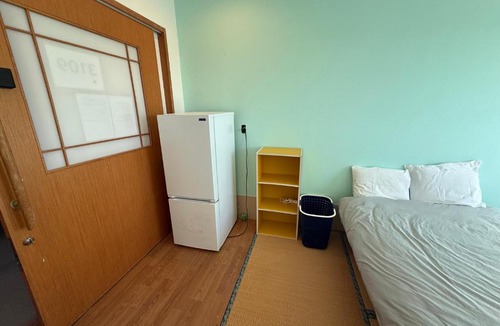 Kin Hostel | ハイ沖縄金武店トイレお風呂共用 プレオープン中駐車場有 ペット同伴可能長期滞在可能2025年10月より車貸し出しサービス有希望であればお申し付けください