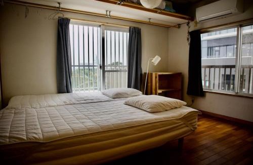 Urasoe House | 一棟貸し 庭とバルコニーの家 Urasoe Garden Retreat