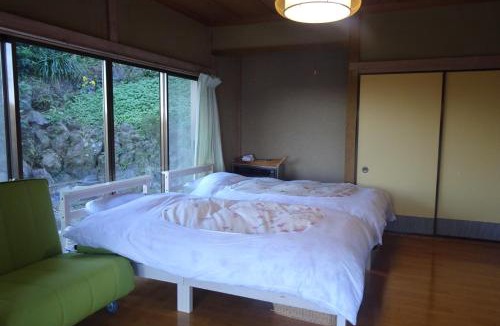 Kawana Apartment | 旅ポストのの花