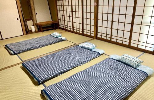 Nango Apartment | 格安素泊まり宿南郷駅徒歩3分サーフトリッププラン最適別プラン有り一軒家丸々貸しサイクルシーズン南郷