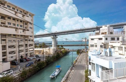 Naha City Centre Villa | 駐車場にコインランドリー畳部屋にお布団も敷けます最上階4階Room