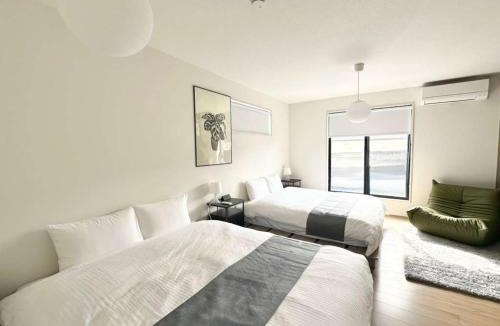 Ozu Apartment | 5 min walk to Ozu Station Premium 4BR Stay by Restavio