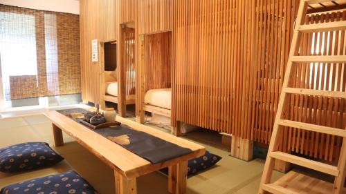 Maeda Apartment | 6つの個室のようなベッドルーム PrivateサウナとBBQテラス 恩納村で過ごす極上の休日 那覇空港送迎 宿泊者価格レンタカー有