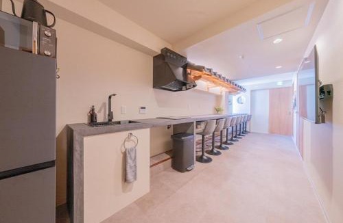 Higashishinsaibashi Apartment | 6ホテル花 道頓堀グリコ 心斎橋に位置する宿 ベッド8台 シャワー2台 観光に最適