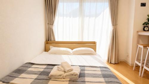 Fukushima Apartment | 605 電車でusjまで8分 梅田まで4分 利便性と上質な滞在を叶えるローカル空間