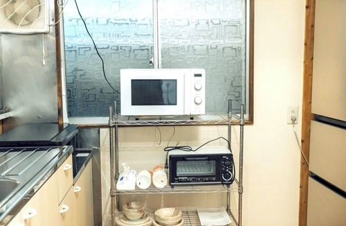 Beppu House | 9 min. walk from Beppu Station/Rental of an old reclaimed house/Max. 6 people/Inn where you can spend a special time with one-of-a-kind vessels and furniture/Free Wi-Fi
