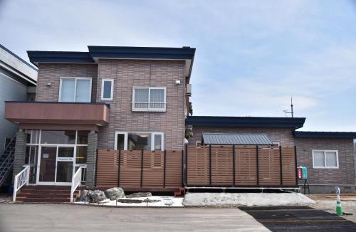 Yoichi Apartment | A large house with a beautifui Japanese-style room