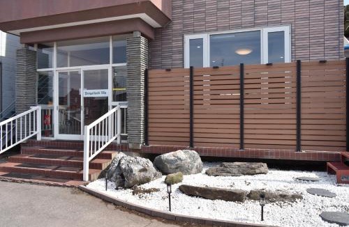 Yoichi Apartment | A large house with a beautifui Japanese-style room