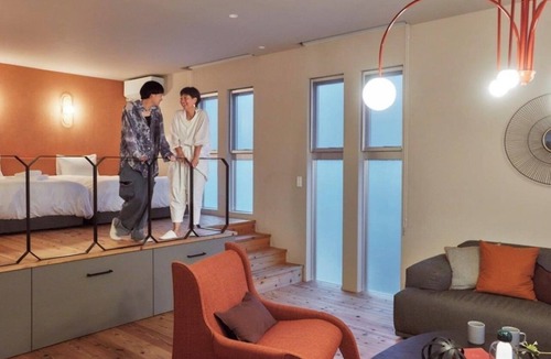 Karimata House | A luxurious inn with a coralcolored interiorEmer / Miyakojima Okinawa