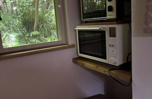 Oshima Cottage | A relaxing space with plasterfinished interior wa/Oshima-machi Tokyo