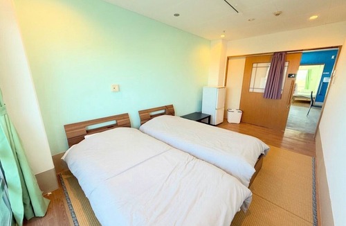 Kin Hotel | A Relaxing Stay in Kin Town, Okinawa | Private Rooms, Dormitories, and Long-Term Stays Available