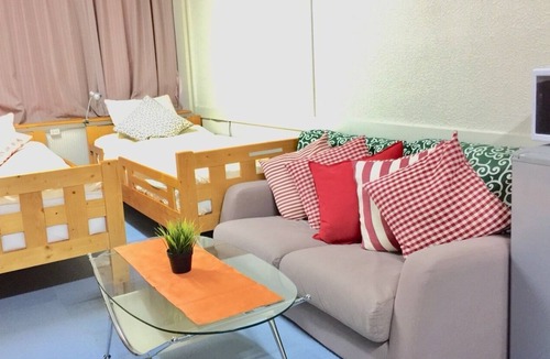 Higashinari Apartment | a room with two toilets and a shower
