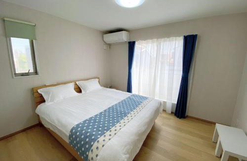 Naniwa Villa | ALL TRUST2馆临近心斋桥道頓堀难波直达梅田关西机场Usj全新独栋别墅四个卧室可住8人超大空间3卫2浴厨房设施齐全电视冰箱洗衣机空调配置齐全免费停车4分钟步行至今宫站