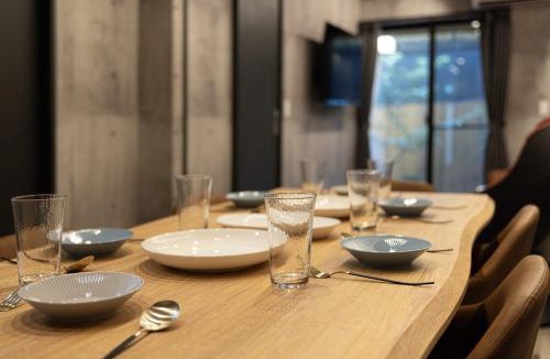 Hakata-ku Villa | An-inーA detached house featuring a garden and a cypress bath