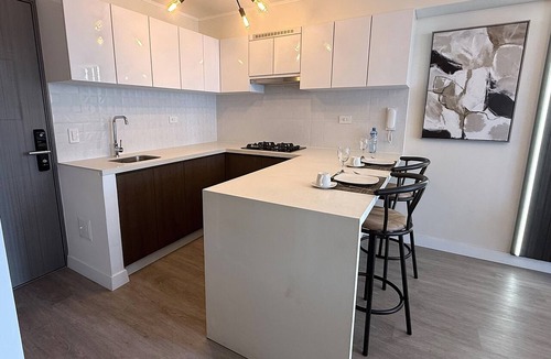San Eugenio Apartment | Aparts4Days Gym, Pool, and Jacuzzi 1-Bedroom Apartment
