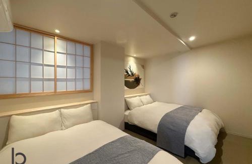 Hiroshima City Centre Apartment | b hotel WAKO Ekimae BLD - Zen Stay Spacious Apartment