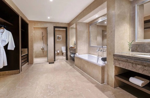 Village Road Resort | Bright Resort Room with Private Terrace, Pools, Beach Access & Entertainment