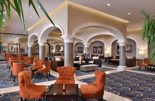 Village Road Resort | Bright Resort Room with Private Terrace, Pools, Beach Access & Entertainment