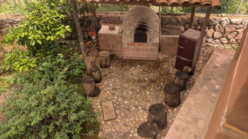 Urubamba Cabin | Casa Nuestra - Room with Private Bathroom in Shared House