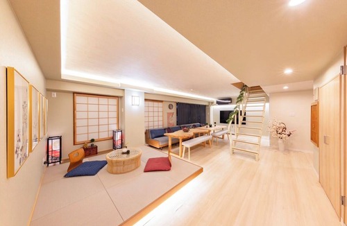 Sennichimae Apartment | Central Namba and Dotonbori | Spacious 7-bedroom, 1-living room, 1-dining room, 1-kitchen unit with a panoramic open-air bath and BBQ, accommodating up to 14 guests