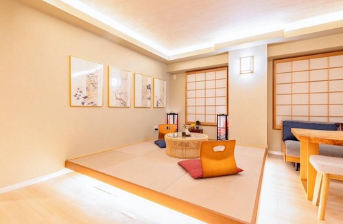Sennichimae Apartment | Central Namba and Dotonbori | Spacious 7-bedroom, 1-living room, 1-dining room, 1-kitchen unit with a panoramic open-air bath and BBQ, accommodating up to 14 guests