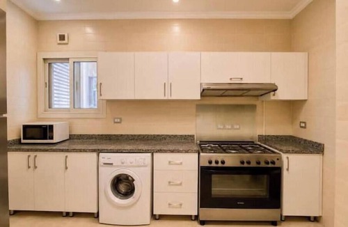 The 5th Settlement Apartment | Chic 2BR Apartment with Private Garden | Prime Location by AUC