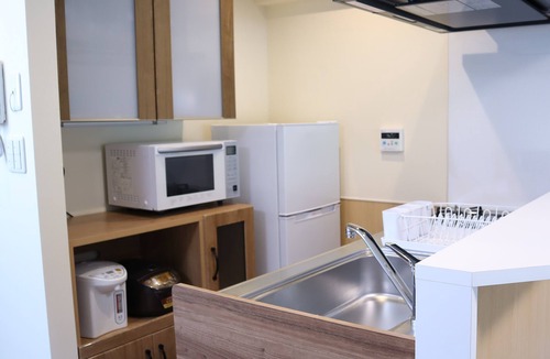 Usami Condo | Condominium Hotel Garland Court Usami