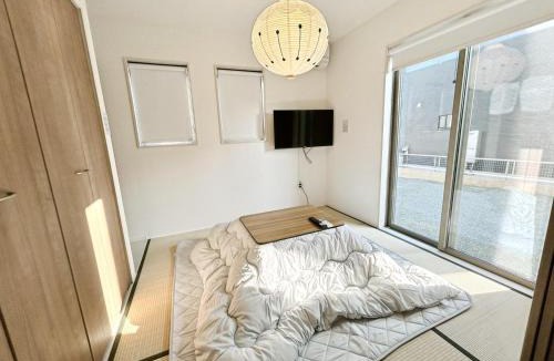Ozu Apartment | Convenient Ozu Location Bright 4BR Stay by Restavio