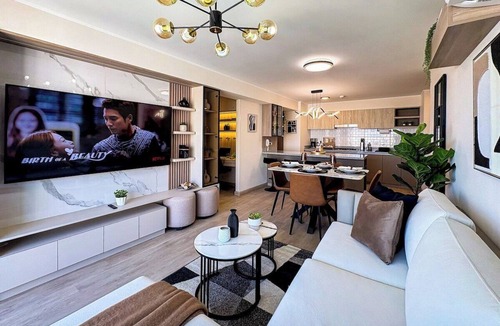 Leuro Apartment | Designer Retreat with Balcony & Stunning City View