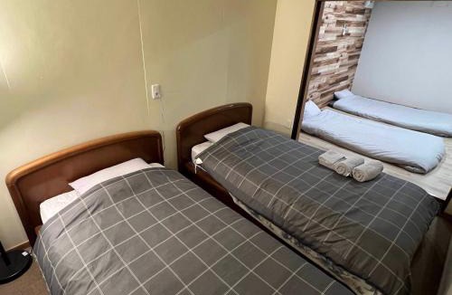 Toyoura Apartment | Fire Base 灯 AKARI